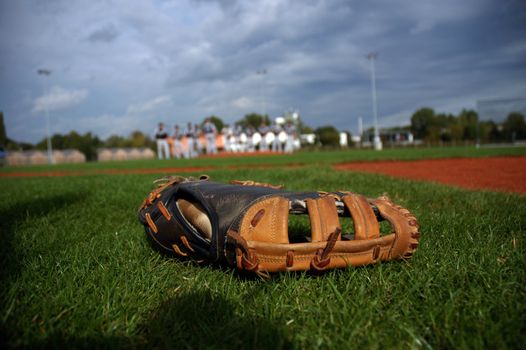 Baseball glove in the grass