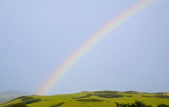 A rainbow over a lovely rural scene