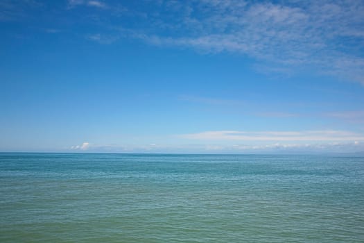 A tranquil view of the sea and sky with plenty of copy space
