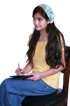 Teenage girl taking notes, part Asian - Scandinavian background
