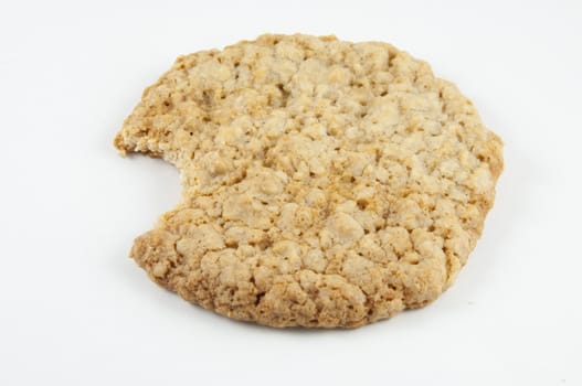 An oatmeal cookie isolated on white