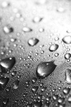 water drops on silver metal surface