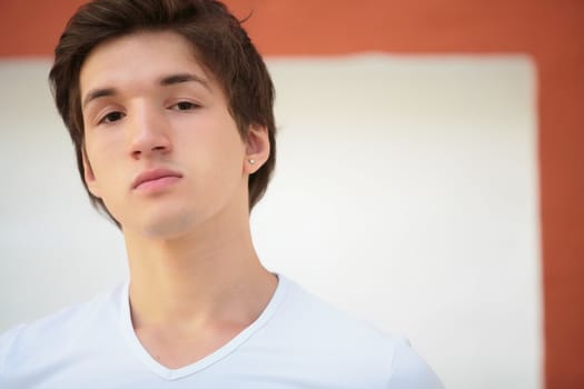 portrait of the young man in white t-shirt