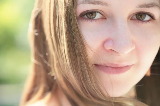 close-up portrait of the romantic green-eyed girl