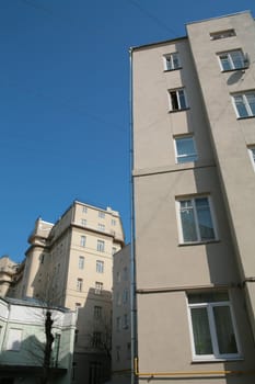 buildings in courtyard of the old Moscow and blue sky