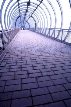 glass tunnel of the street pedestrian crossing