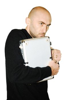 image of a young man protecting his metal case isolated on white