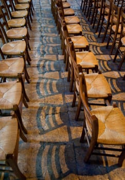Rows of chairs in Chartres cathedral