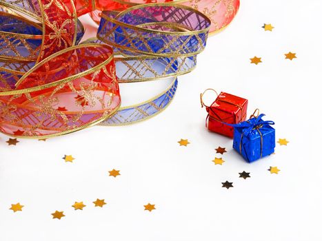 christmas decorative ribbon and presents on white