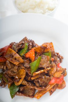 typical chinese dish,fresh beef stir fried with pepperrs bamboo sprout and mushrooms