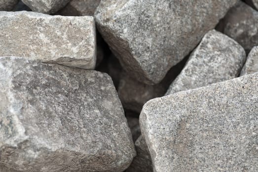 a bunch of cobblestones at a building site