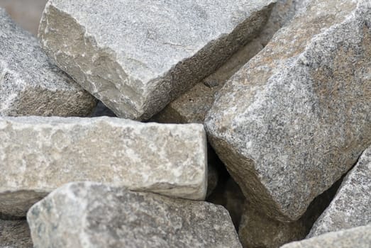 a bunch of cobblestones at a building site