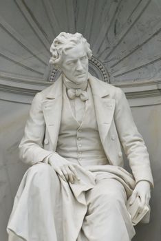 a sculpture of the famous austrian lyric poet franz grillparzer which is located in the vienna volksgarten