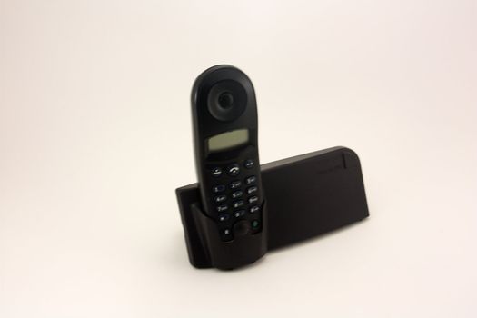 modern cordless phone, shot high-key over white