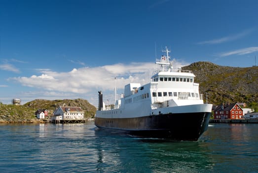 The ferry in a fjord of north Norway