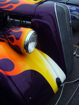 Purple hotrod with colorful flames