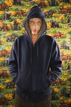 Portrait of a Mid-adult Caucasian male wearing a hoodie.