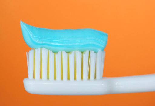 Toothbrush, orange background