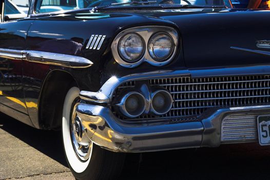 A black 1958 Chevy Impala classic car