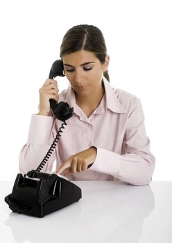 Beautiful business woman speaking at the phone