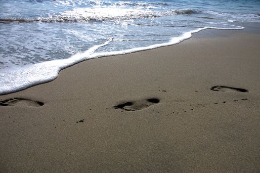 Footprints on the beach of Puerto Escondido