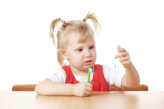 child with a teeth brush