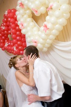 bride and groom kissing