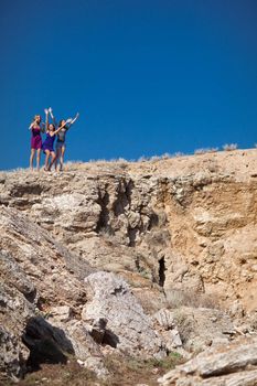 three happy girls in the mountain