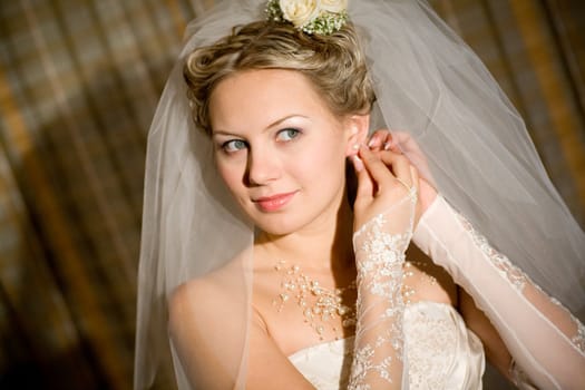 a bride playes with her dress