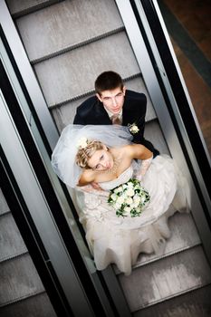 bride and groom in metro