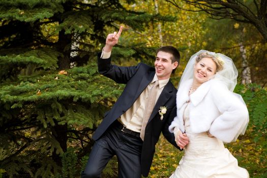 bride and groom in the park