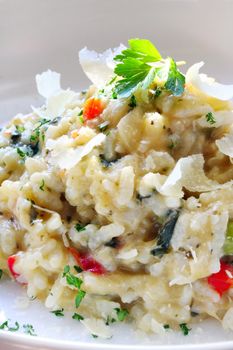 Chicken and garlic risotto, with shaved parmesan and parsley.