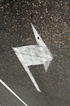 Abstraction, Symbol, White Arrow on Gray Asphalt