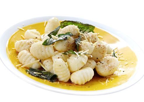 Potato gnocchi with burnt sage butter and parmesan cheese.