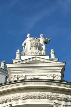 Vintage, Architectral Superstructure of the Building 30's, Sculptural Composition on Background Blue Sky