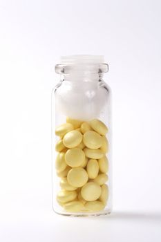 Yellow Capsules with Medicament in Vial