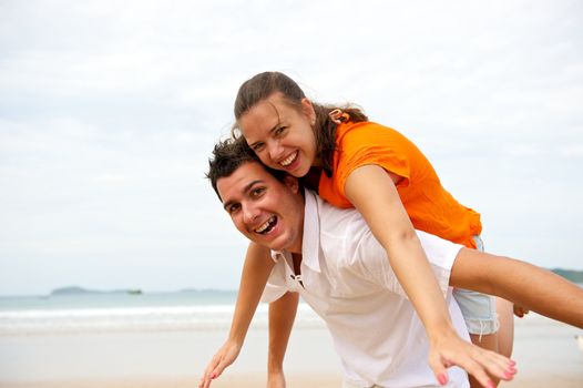 Younf couple enjoying the beach in Brazil