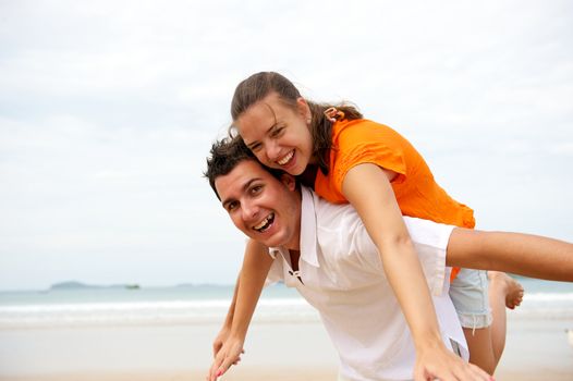 Younf couple enjoying the beach in Brazil