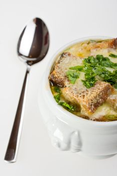onion soup scalloped with cheese in a soup pot