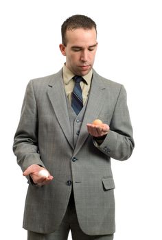 Concept image of a businessman using his hands to weigh the pros and cons
