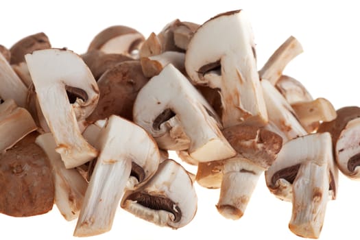 heap of chopped mushrooms on a wooden board