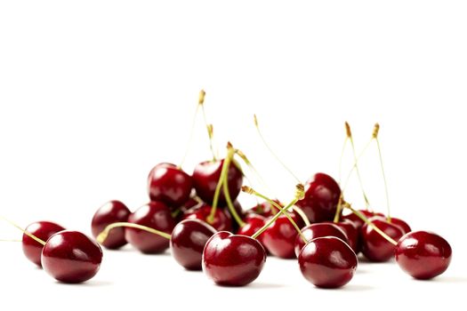 some cherries on white background