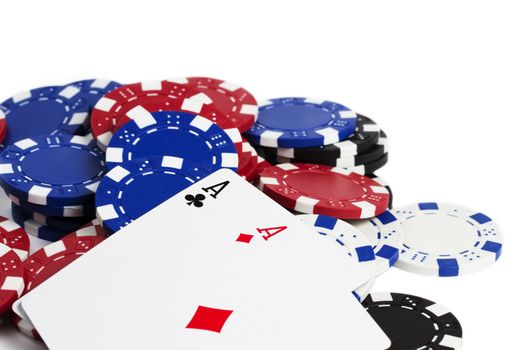 two aces on chips with white background
