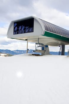 Top station of the chair lift in ski resort