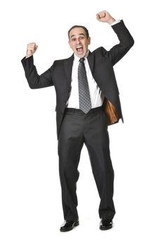 Triumphant businessman in a suit isolated on white background