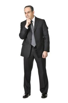 Thinking businessman in a suit isolated on white background