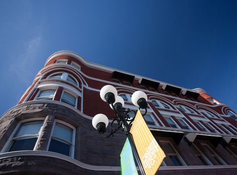 Gaslamp district of San Diego with the old Keating building set by ornate gas lamps