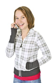 Teenage girl talking on a cell phone isolated on white background