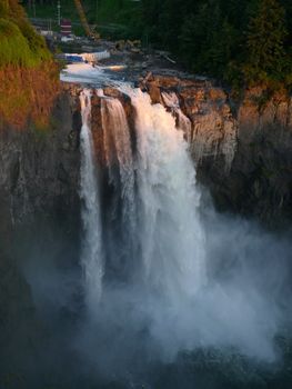 view of a waterfall at dusk