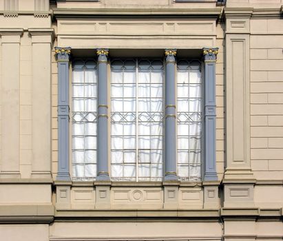 Ancient window with columns
